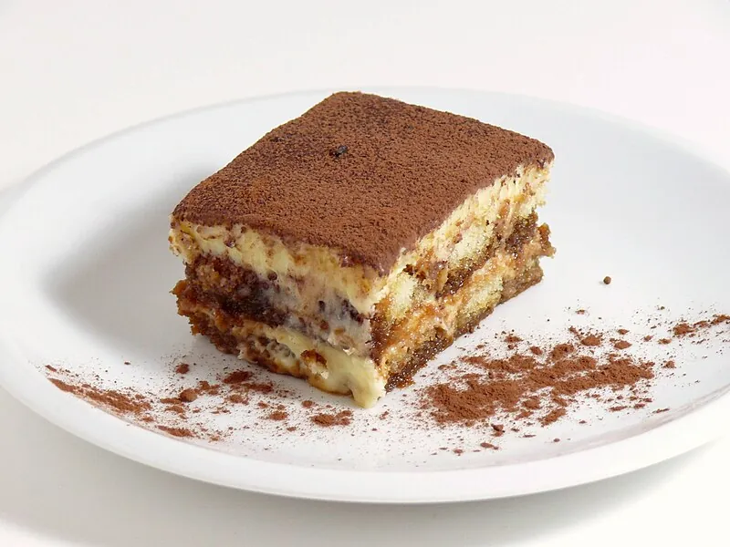 Tiramisu — the Italian dessert of mascarpone cream, savoiardi biscuits soaked in espresso and marsala, dusted with cocoa — coffee's most famous appearance in food